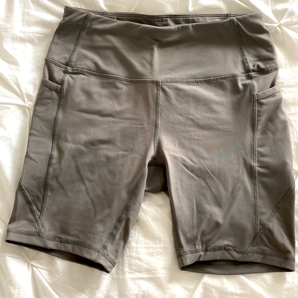 Olive green biker shorts with pockets